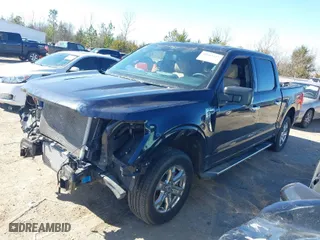 2023 Ford F-150 XL with VIN 1FTEW1CP9PKF94539, listed as a IAAI auction lot 41662217 with 24,614 mi miles. Bid and sale history available at carsss.com. Image 2.