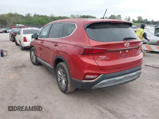 2019 Hyundai Santa Fe SE with VIN 5NMS2CAD5KH053852, listed as a IAAI auction lot 41962062 with 127,177 mi miles. Bid and sale history available at carsss.com. Image 3.