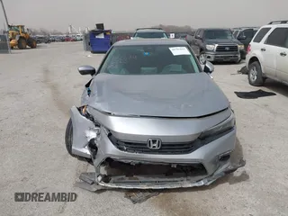 2023 Honda Civic EX with VIN 2HGFE1F77PH321210, listed as a IAAI auction lot 41797011 with 8,748 mi miles and . Bid and sale history available at DreamBid. Image 12.