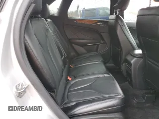 2015 Lincoln MKC z VIN 5LMCJ2A94FUJ10689, wystawiony jako Copart lot #49952045 z przebiegiem 128 040 mil mil oraz Szkoda całkowita • Salvage title. Historia ofert i sprzedaży dostępna na DreamBid. Obrazek 10.