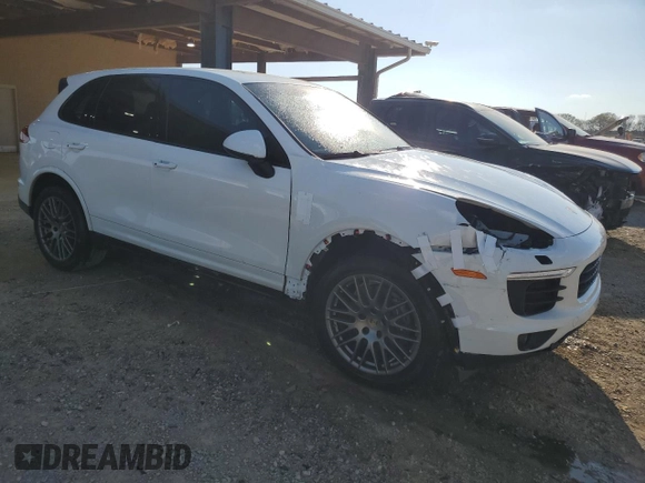 2018 Porsche Cayenne z VIN WP1AA2A2XJKA06647, wystawiony jako Copart lot #50317955 z przebiegiem 53 892 mil mil oraz Szkoda całkowita • Salvage title. Historia ofert i sprzedaży dostępna na DreamBid. Obrazek 4.