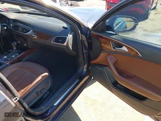 2014 Audi A6 2.0T Premium Plus with VIN WAUGFAFC4EN133050, listed as a IAAI auction lot 41625553 with 130,251 mi miles. Bid and sale history available at carsss.com. Image 5.