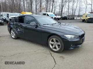 2013 BMW 3 Series 328i xDrive with VIN WBA3B3C51DJ976382, listed as a Copart auction lot 52262085 with 110,432 mi miles and Salvage title. Bid and sale history available at DreamBid. Image 4.