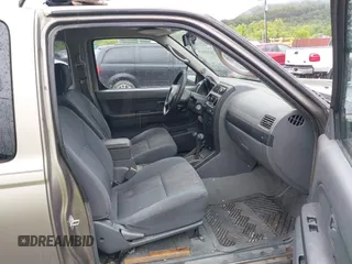 2004 Nissan Frontier XE Desert Runner z VIN 1N6ED26Y84C449544, wystawiony jako IAAI lot #42359120 z przebiegiem 157 483 mil mil oraz . Historia ofert i sprzedaży dostępna na DreamBid. Obrazek 5.