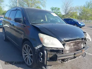 2007 Honda Odyssey EX-L with VIN 5FNRL386X7B128430, listed as a IAAI auction lot 42146089 with 231,059 mi miles and . Bid and sale history available at DreamBid. Image 1.