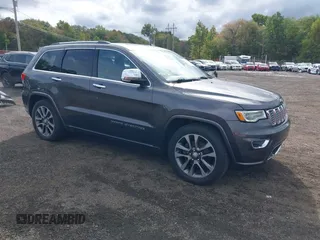 2018 Jeep Grand Cherokee High Altitude with VIN 1C4RJFCGXJC440470, listed as a IAAI auction lot 40459789 with 126,854 mi miles and . Bid and sale history available at DreamBid. Image 1.