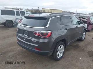 2021 Jeep Compass Latitude with VIN 3C4NJDBBXMT551702, listed as a IAAI auction lot 42045266 with 67,882 mi miles and . Bid and sale history available at DreamBid. Image 4.
