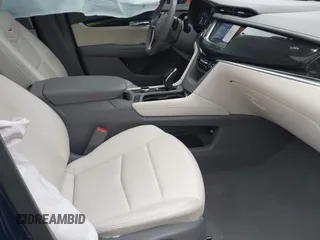 2023 Cadillac XT6 AWD Premium Luxury with VIN 1GYKPDRS2PZ126666, listed as a IAAI auction lot 40963833 with 23,535 mi miles and . Bid and sale history available at DreamBid. Image 5.