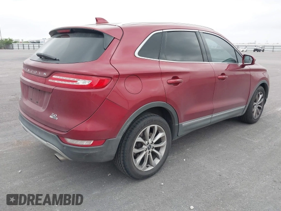 2015 Lincoln MKC with VIN 5LMCJ1A97FUJ30994, listed as a IAAI auction lot 42159219 with 180,802 mi miles. Bid and sale history available at carsss.com. Image 4.