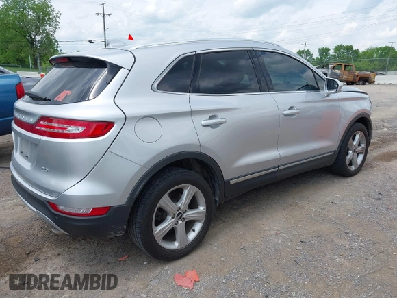 2018 Lincoln MKC Premiere with VIN 5LMCJ1C94JUL08589, listed as a IAAI auction lot 42133449 with 90,827 mi miles and . Bid and sale history available at DreamBid. Image 4.
