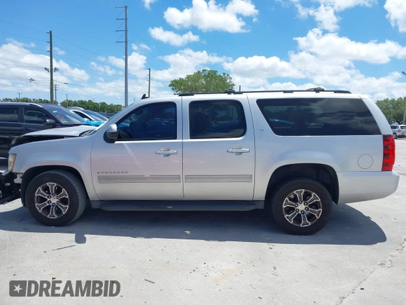 2012 Chevrolet Suburban LT with VIN 1GNSCJE04CR230288, listed as a IAAI auction lot 42049580 with 166,596 mi miles. Bid and sale history available at carsss.com. Image 14.