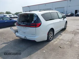 2023 Chrysler Pacifica Limited with VIN 2C4RC1GG7PR566163, listed as a IAAI auction lot 42393988 with 59,354 mi miles and . Bid and sale history available at DreamBid. Image 4.