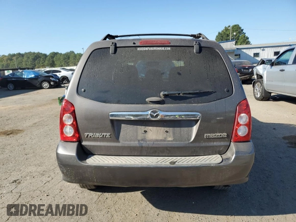 2006 Mazda Tribute S with VIN 4F2YZ06136KM31485, listed as a Copart auction lot 75412344 with Not Provided miles and Salvage Title. Bid and sale history available at DreamBid. Image 6.