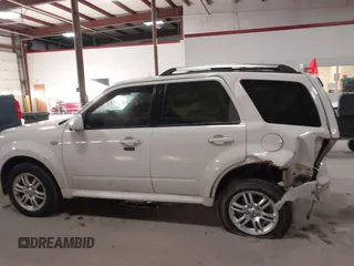 2009 Mercury Mariner Premier with VIN 4M2CU97729KJ00086, listed as a IAAI auction lot 41418490 with 167,486 mi miles. Bid and sale history available at carsss.com. Image 14.