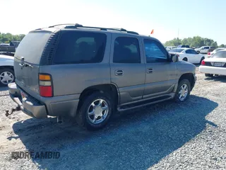2005 GMC Yukon Denali z VIN 1GKEK63U35J229473, wystawiony jako IAAI lot #42266936 z przebiegiem 246 373 mil mil oraz . Historia ofert i sprzedaży dostępna na DreamBid. Obrazek 4.