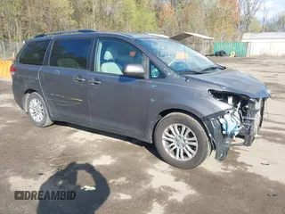 2014 Toyota Sienna XLE with VIN 5TDYK3DC5ES475750, listed as a IAAI auction lot 41976805 with 221,804 mi miles. Bid and sale history available at carsss.com. Image 1.