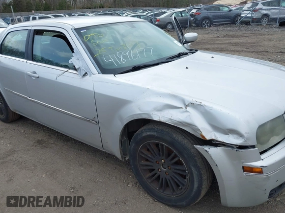 2009 Chrysler 300 Touring with VIN 2C3KA53V69H500462, listed as a IAAI auction lot 41896177 with 213,761 mi miles. Bid and sale history available at carsss.com. Image 6.