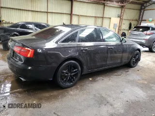 2015 Audi A6 with VIN WAUFFCFC9FN017044, listed as a Copart auction lot 51553694 with 181,733 mi miles and Salvage title. Bid and sale history available at DreamBid. Image 3.