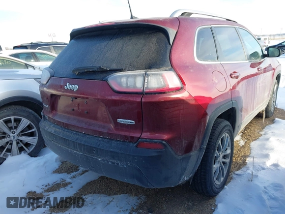 2019 Jeep Cherokee Latitude Plus with VIN 1C4PJMLB6KD465474, listed as a IAAI auction lot 41563058 with 74,680 mi miles. Bid and sale history available at carsss.com. Image 4.
