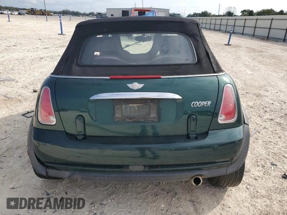2007 MINI Convertible with VIN WMWRF33567TF66784, listed as a Copart auction lot 71571744 with 115,008 mi miles and Salvage Title. Bid and sale history available at DreamBid. Image 6.