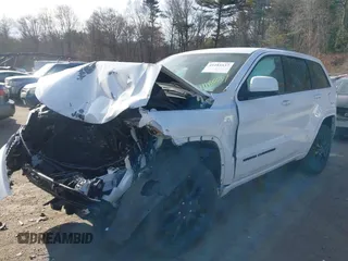2017 Jeep Grand Cherokee Laredo with VIN 1C4RJFAG9HC910422, listed as a IAAI auction lot 41185537 with 84,784 mi miles. Bid and sale history available at carsss.com. Image 2.