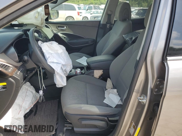 2018 Hyundai Santa Fe 2.4L z VIN 5NMZTDLB9JH079656, wystawiony jako Copart lot #54256175 z przebiegiem 100 678 mil mil oraz Szkoda całkowita • Salvage title. Historia ofert i sprzedaży dostępna na DreamBid. Obrazek 7.