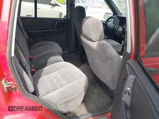 1996 Jeep Grand Cherokee Laredo with VIN 1J4FX58S4TC346218, listed as a IAAI auction lot 41943268 with 138,431 mi miles and . Bid and sale history available at DreamBid. Image 8.