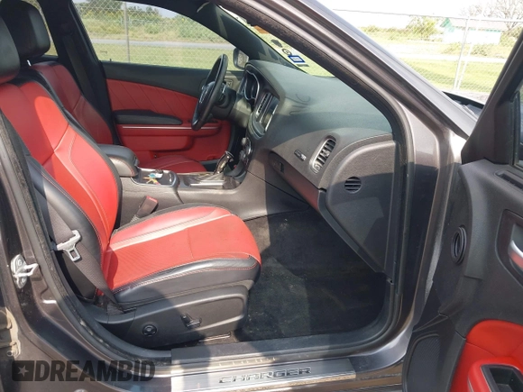 2015 Dodge Charger SXT with VIN 2C3CDXHG7FH886502, listed as a IAAI auction lot 42072027 with 105,034 mi miles and . Bid and sale history available at DreamBid. Image 5.