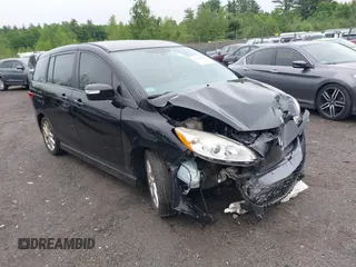 2014 Mazda 5 Touring z VIN JM1CW2CL4E0174125, wystawiony jako IAAI lot #42430883 z przebiegiem 151 284 mil mil oraz . Historia ofert i sprzedaży dostępna na DreamBid. Obrazek 1.