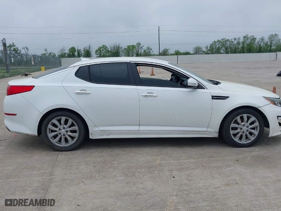 2015 Kia Optima EX with VIN 5XXGN4A76FG491572, listed as a IAAI auction lot 41940147 with 119,770 mi miles. Bid and sale history available at carsss.com. Image 13.