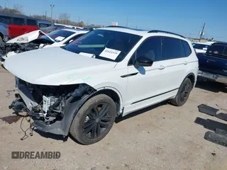 2022 Volkswagen Tiguan SE R-Line Black with VIN 3VVCB7AX4NM165115, listed as a IAAI auction lot 41624320 with 18,074 mi miles and . Bid and sale history available at DreamBid. Image 17.