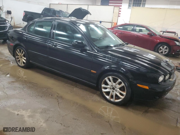 2005 Jaguar X-Type 3.0L with VIN SAJWA51C05WE41522, listed as a Copart auction lot 62837564 with 91,885 mi miles and Clean Title. Bid and sale history available at carsss.com. Image 4.