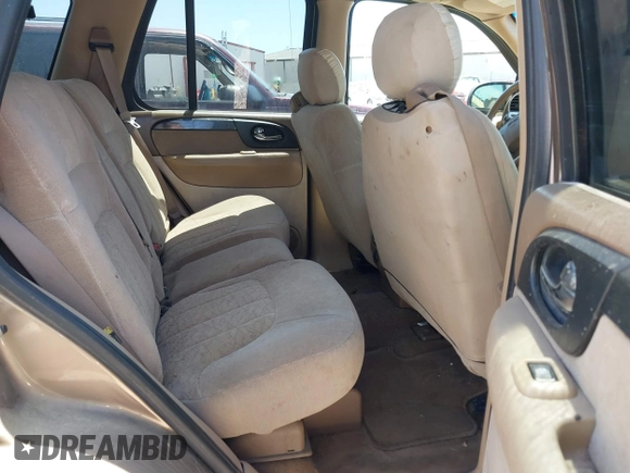 2003 GMC Envoy SLT with VIN 1GKDS13S432246741, listed as a IAAI auction lot 42051902 with 344,691 mi miles and . Bid and sale history available at DreamBid. Image 8.