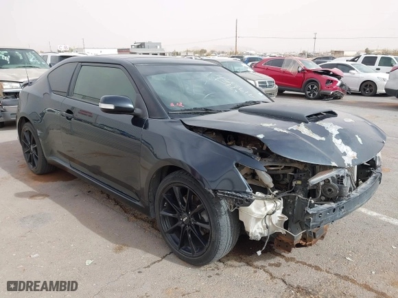 2016 Scion tC with VIN JTKJF5C76GJ017584, listed as a IAAI auction lot 41938981 with 121,166 mi miles. Bid and sale history available at carsss.com. Image 1.