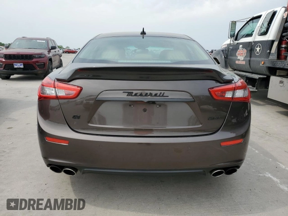 2014 Maserati Ghibli S Q4 with VIN ZAM57RTA6E1085708, listed as a Copart auction lot 53710095 with 110,799 mi miles and Salvage title. Bid and sale history available at DreamBid. Image 6.