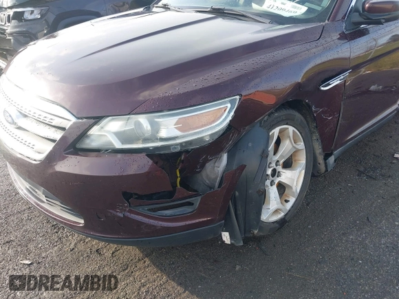 2011 Ford Taurus SEL with VIN 1FAHP2EW5BG172466, listed as a IAAI auction lot 41209469 with 237,178 mi miles. Bid and sale history available at carsss.com. Image 6.