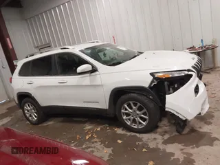 2016 Jeep Cherokee Latitude with VIN 1C4PJMCB1GW119621, listed as a IAAI auction lot 41310872 with 123,841 mi miles. Bid and sale history available at carsss.com. Image 13.