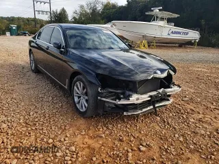 2018 BMW 7 Series 740i xDrive with VIN WBA7E4C5XJGV24003, listed as a Copart auction lot 71395443 with 63,558 mi miles. Bid and sale history available at carsss.com. Image 11.