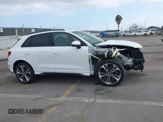 2022 Audi Q3 S line Premium Plus with VIN WA1EECF35N1017446, listed as a IAAI auction lot 42083430 with 37,713 mi miles and . Bid and sale history available at DreamBid. Image 14.