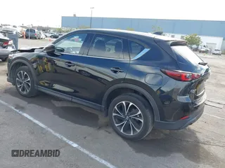 2023 Mazda CX-5 2.5 S Premium Package with VIN JM3KFBDM4P0266378, listed as a IAAI auction lot 41655712 with 31,746 mi miles. Bid and sale history available at carsss.com. Image 3.