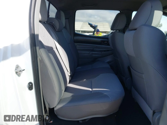 2015 Toyota Tacoma PreRunner with VIN 3TMKU4HN6FM044238, listed as a IAAI auction lot 41534623 with 196,490 mi miles and . Bid and sale history available at DreamBid. Image 8.