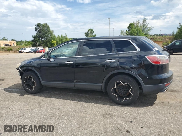 2012 Mazda CX-9 Grand Touring z VIN JM3TB2DAXC0358272, wystawiony jako Copart lot #60703665 z przebiegiem 278 558 mil mil oraz Szkoda całkowita • Salvage title. Historia ofert i sprzedaży dostępna na DreamBid. Obrazek 2.
