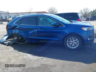 2024 Ford Edge SEL z VIN 2FMPK4J96RBA12822, wystawiony jako IAAI lot #41940628 z przebiegiem 8 981 mil mil oraz . Historia ofert i sprzedaży dostępna na DreamBid. Obrazek 14.