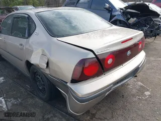 2002 Chevrolet Impala with VIN 2G1WF52E429216076, listed as a IAAI auction lot 41814683 with 153,908 mi miles. Bid and sale history available at carsss.com. Image 6.