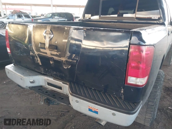 2006 Nissan Titan SE z VIN 1N6AA07AX6N509540, wystawiony jako IAAI lot #42054973 z przebiegiem 166 413 mil mil oraz . Historia ofert i sprzedaży dostępna na DreamBid. Obrazek 6.