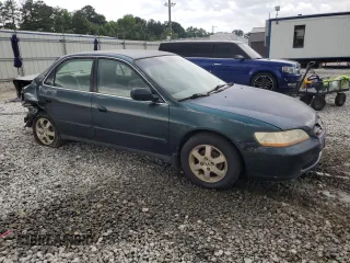 2000 Honda Accord SE with VIN 1HGCG5677YA049486, listed as a Copart auction lot 58548565 with 267,067 mi miles and Salvage title. Bid and sale history available at DreamBid. Image 4.