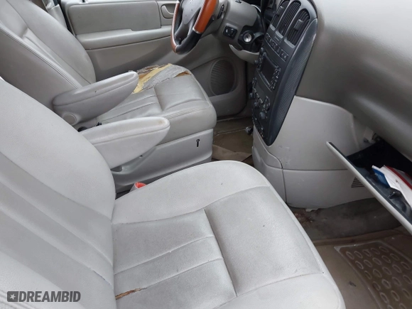 2006 Dodge Grand Caravan SXT with VIN 2D4GP44L16R616863, listed as a IAAI auction lot 41927585 with 999,999 mi miles. Bid and sale history available at carsss.com. Image 5.