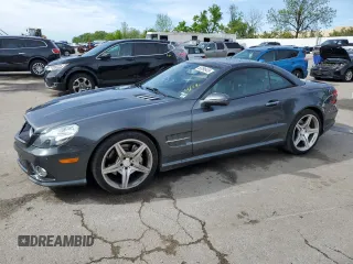 2011 Mercedes-Benz SL 550 with VIN WDBSK7BA8BF165603, listed as a Copart auction lot 55096435 with 103,736 mi miles and Salvage title. Bid and sale history available at DreamBid. Image 1.