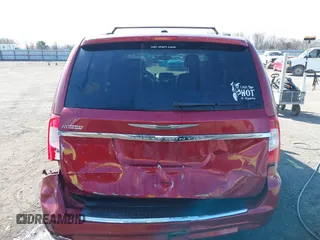 2013 Chrysler Town & Country Touring z VIN 2C4RC1BG7DR777172, wystawiony jako IAAI lot #41780881 z przebiegiem 196 768 mil mil oraz . Historia ofert i sprzedaży dostępna na DreamBid. Obrazek 16.