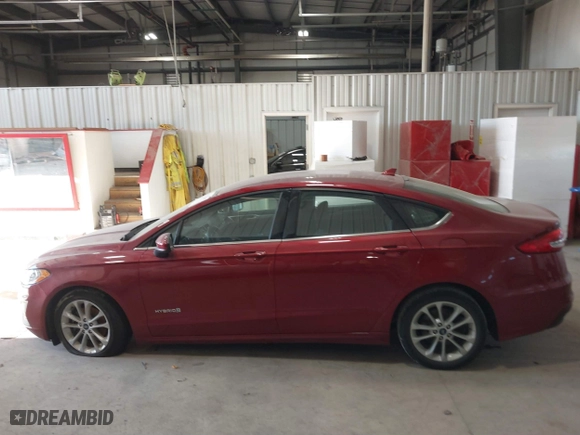 2019 Ford Fusion Hybrid SE with VIN 3FA6P0LUXKR205712, listed as a IAAI auction lot 41267049 with 124,687 mi miles. Bid and sale history available at carsss.com. Image 14.